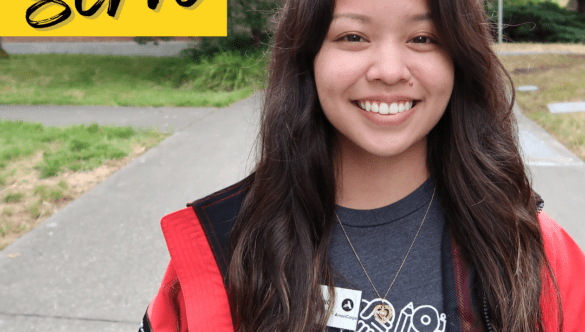 Student Success Coach, Maya Hirano headshot in City Year uniform (red jacket)